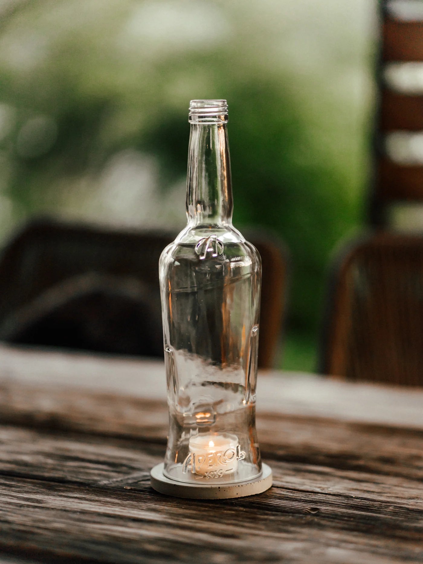 Aperol Windlicht mit Beton Untersetzer von MaBe - handgefertigtes Lichtobjekt aus der 0,7-Liter-Flasche